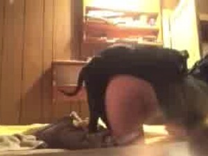 Teen girl and dog in a brief moment of passion