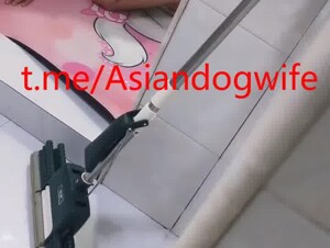 Chinese nurse have fun with dog