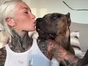 Dog’s tongue in girls mouth