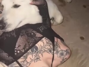 Tattoo girl with white dog