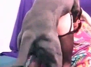 Zoophilic chick enjoys black dog cock